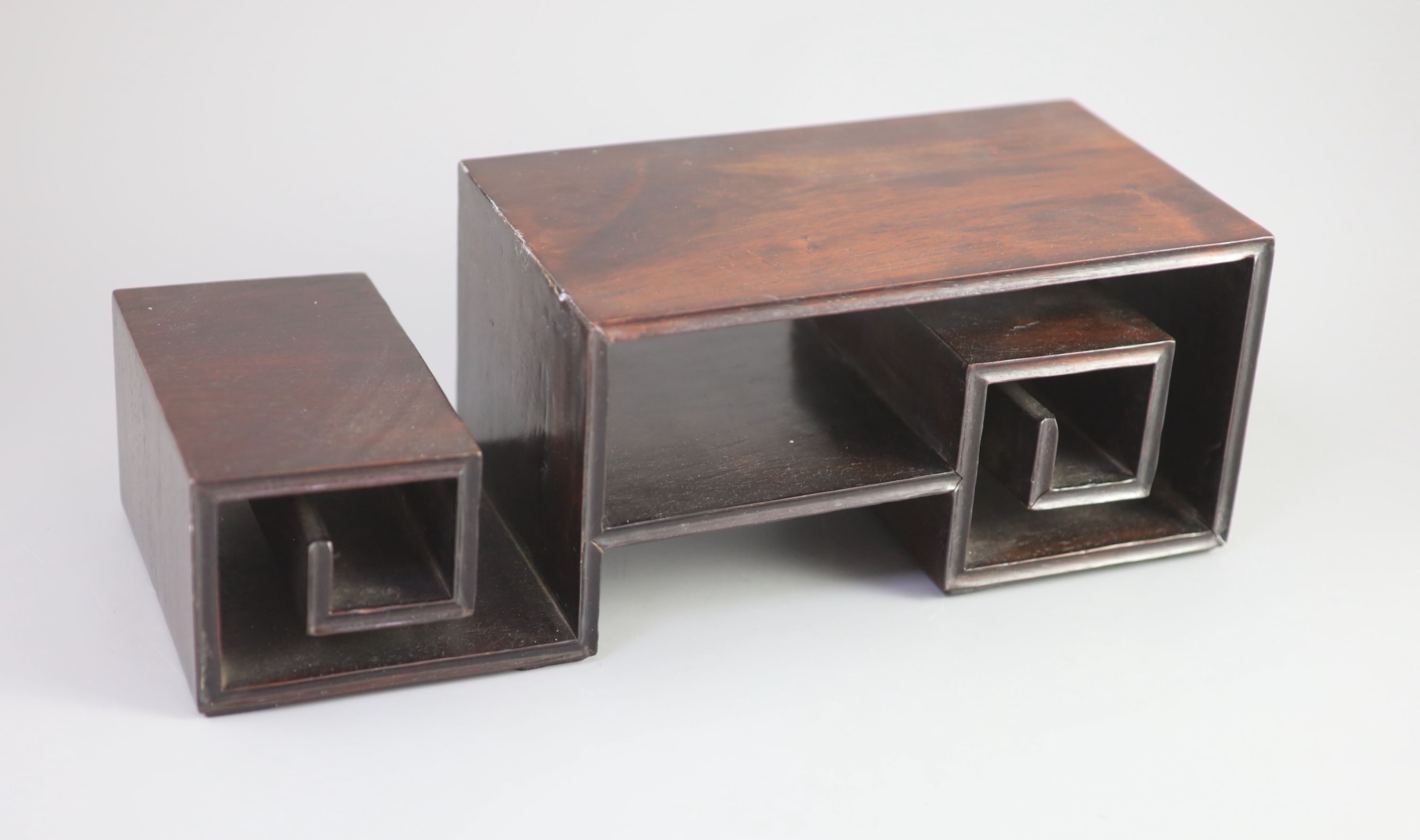 A Chinese hongmu scholar’s stand, 19 century, 34 cm wide